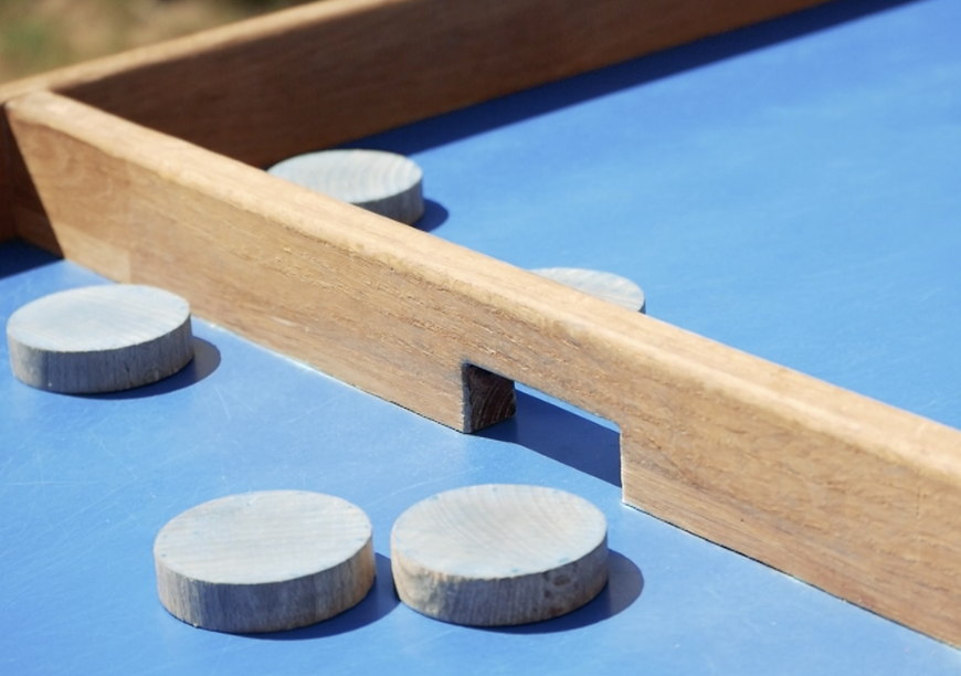 Photo Règles du jeu en bois Passe-trappe avec palets